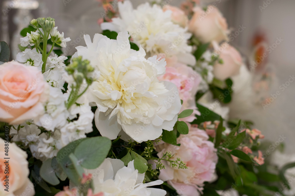 Main table at a wedding reception with beautiful fresh flowers Main table at a wedding reception with beautiful fresh flowers
