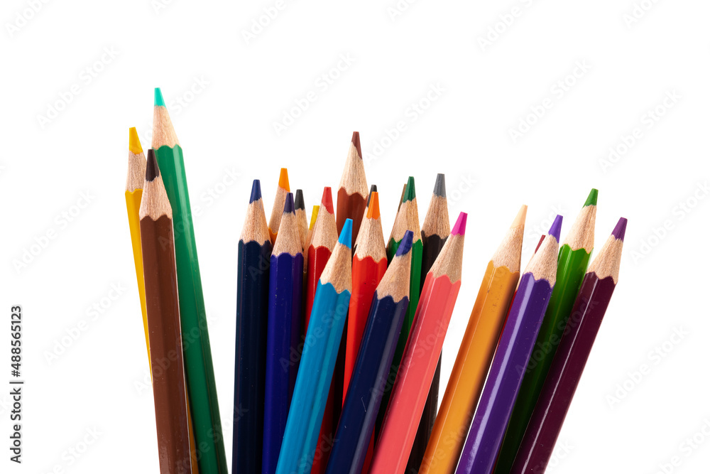 Many multicolored pencils, isolated on white background with copy space. Art and education background. Many multicolored pencils, isolated on white background with copy space. Art and education background.