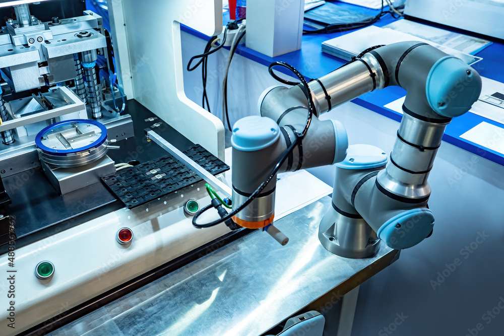 Robot manipulator. Robotic soldering in production. Robotic production ...