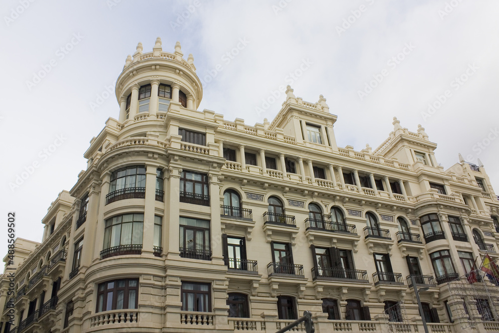 Rich decoration of beautiful historical building in Old Town of Madrid, Spain