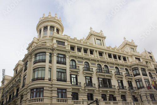 Rich decoration of beautiful historical building in Old Town of Madrid, Spain