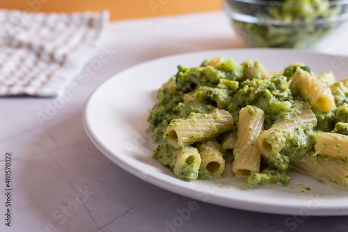 Creamy macaroni pasta with cheese and broccoli. Quick and easy vegetarian recipe.