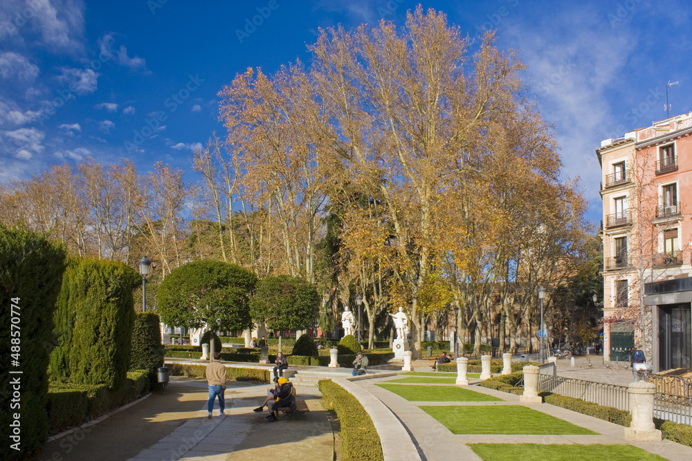 Park with king statues near Royal Palace at Plaza de Oriente in Madrid, Spain