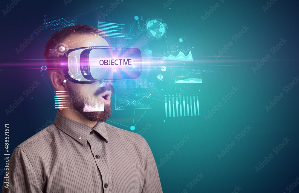 Businessman looking through Virtual Reality glasses Businessman looking through Virtual Reality glasses