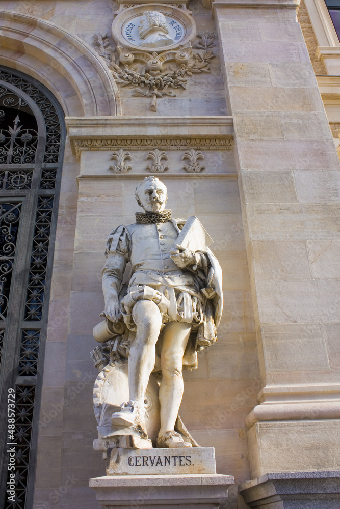 Statue of Miguel Cervantes near National Library of Spain in Madrid, Spain Statue of Miguel Cervantes near National Library of Spain in Madrid, Spain