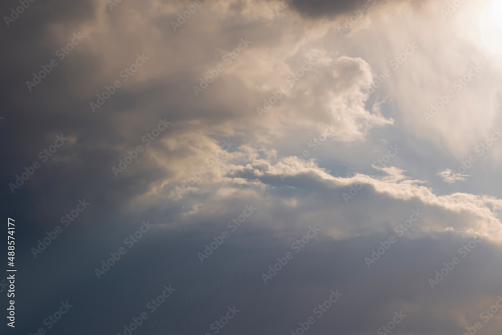 A sunbeam through the clouds. Dramatic sky. Natural background.