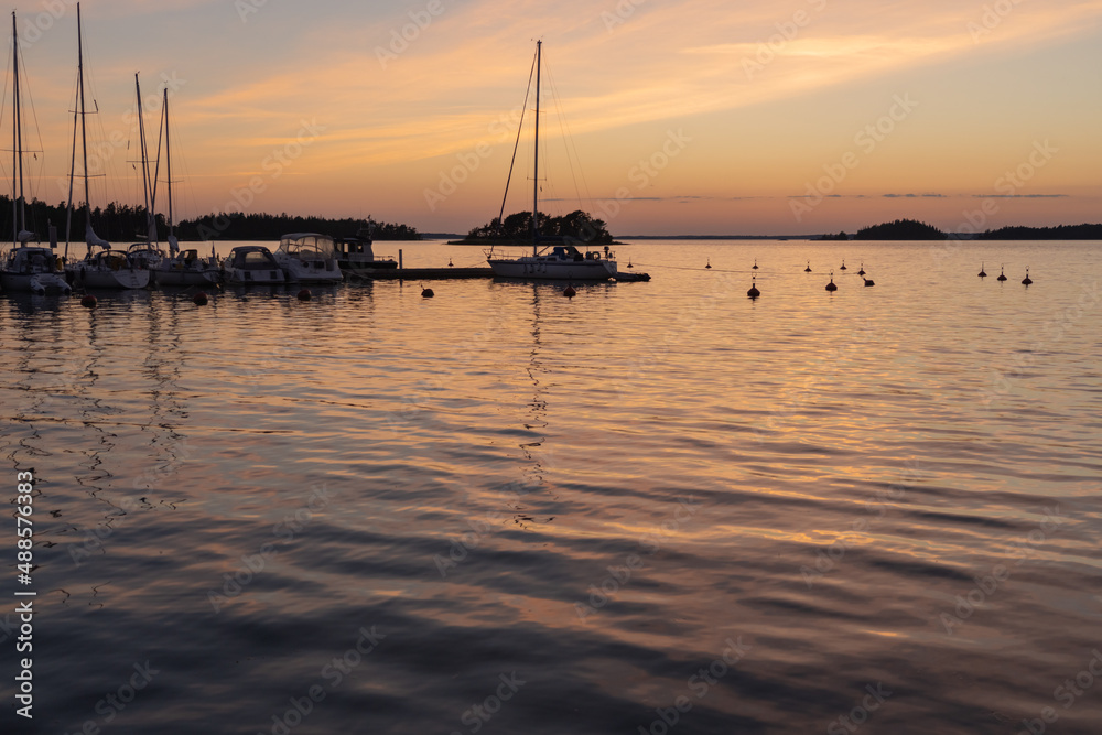 Finland. Turku. July 3, 2021 Yachts at the pier. Sunset on the sea. . Vacation, vacation, relaxation concept