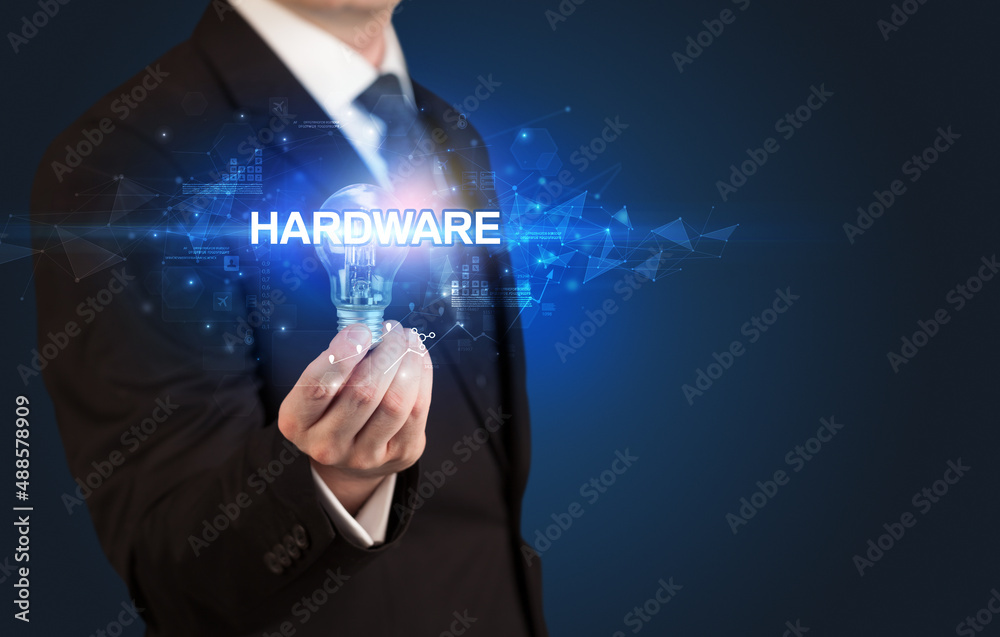 Businessman holding a light bulb Businessman holding a light bulb