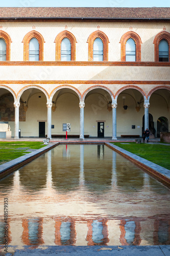 courtyard of the Italian fortification of the eleventh century with an arcade and a fountain © Alevtina