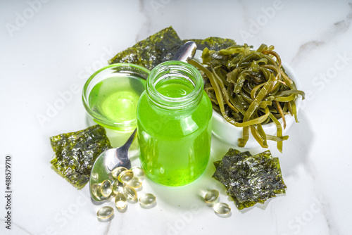 Algae based Oil, Seaweed alternative vegan oil, monounsaturated healthy fat ingredient with Algae Seaweeds photo