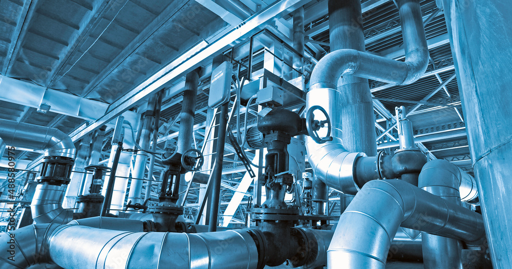 Equipment, cables and piping as found inside of industrial power plant Equipment, cables and piping as found inside of industrial power plant