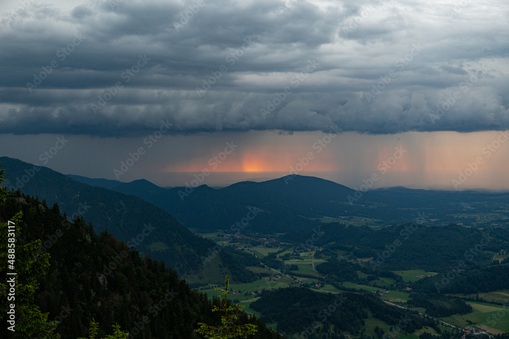 View of storm and clouds over the mountains in the summer season. thunderstorm and rain.