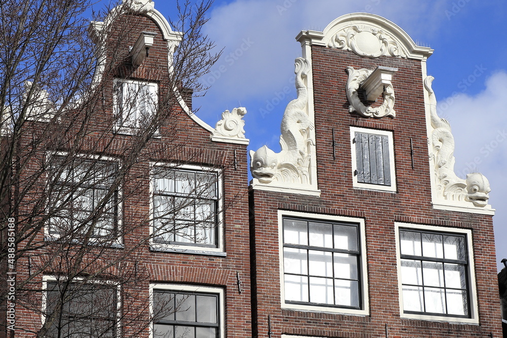 Fototapeta premium Amsterdam Brouwersgracht Canal Historic House Facades Close Up with Sculpted Fish, Netherlands