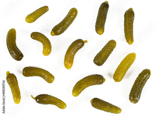 small pickled cucumbers isolated on white background photo