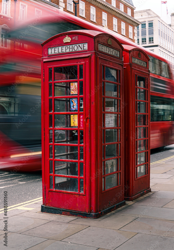 london city red telephone box with red london bus in the background london city red telephone box with red london bus in the background