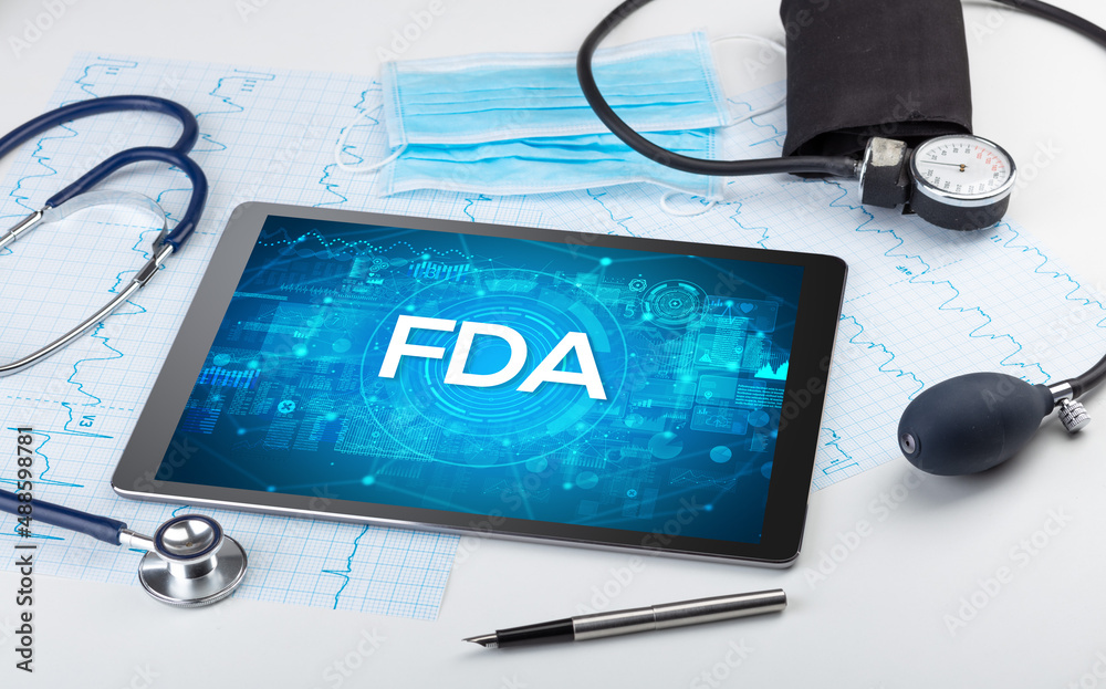 Close-up view of a tablet pc with medical abbreviation