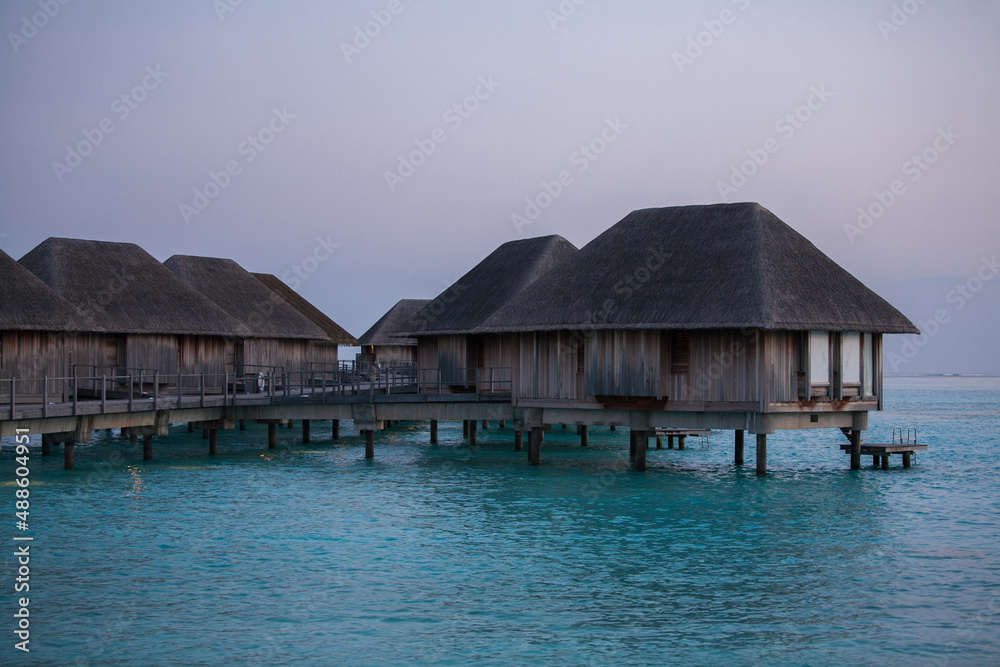 Water Bungalows in Turquoise Sea at Maldives