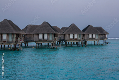 Water Bungalows in Turquoise Sea at Maldives
