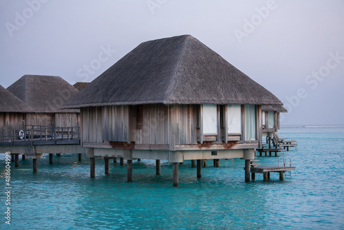 Water Bungalows in Turquoise Sea at Maldives © maodoltee