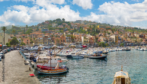 Aci Trezza (Italy) - A view of tourist fishing village, in municipality of Aci Castello, metropolitan city of Catania, Sicily island and region. Famous for the 