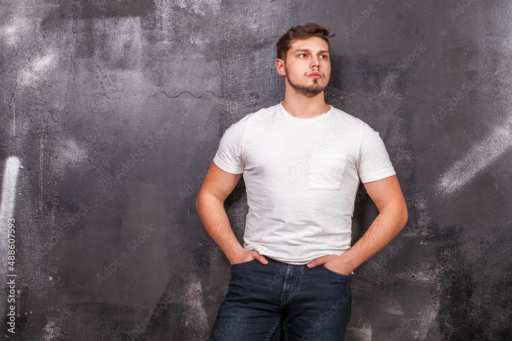 Close up portrait of a young guy in a white t-shirt Close up portrait of a young guy in a white t-shirt