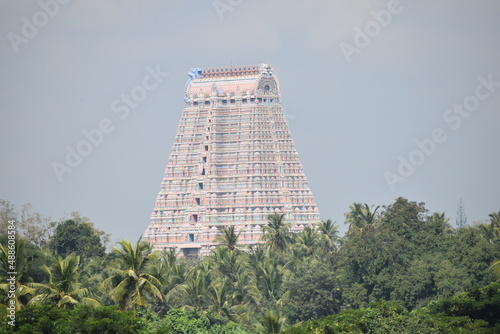 beautiful view of temple gopuram colorful art works with blue background photo