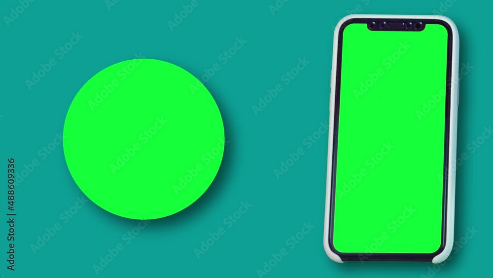 smartphone with chroma key background appearing on screen with green circle for app presentation