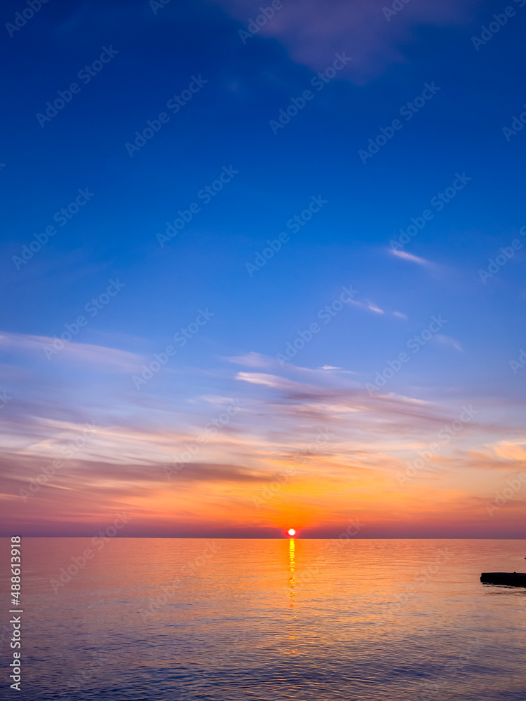  Summer sea design template. Beautiful sunset on tropical beach  and sunlight on horizon