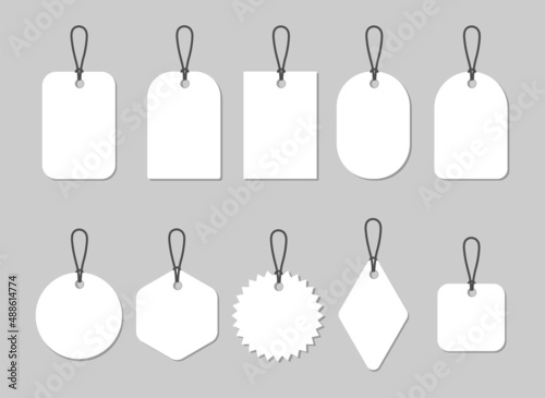 Paper price tags or labels of various shapes. Gift tags with blank white background. Designer sticker. Place for prices and discounts. Set of icons isolated on a gray background. Vector