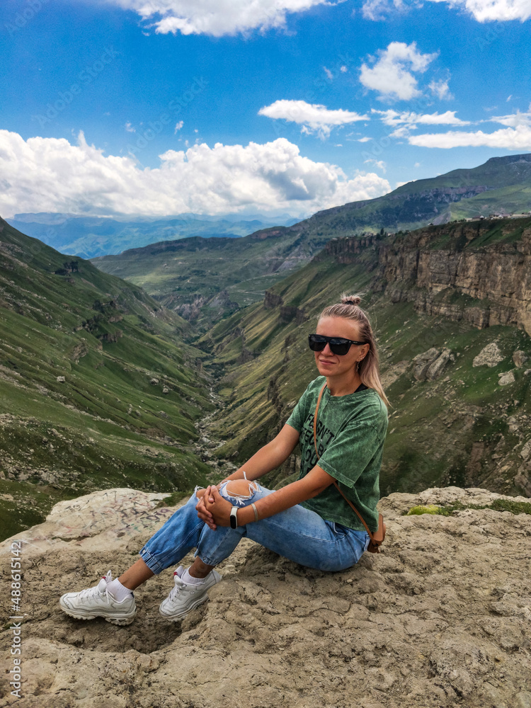A girl on the background of the Khunzakh valley, Khunzakh waterfalls, Dagestan 2021 A girl on the background of the Khunzakh valley, Khunzakh waterfalls, Dagestan 2021