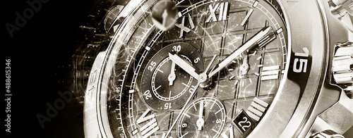 Luxury wrist watch on dark background.