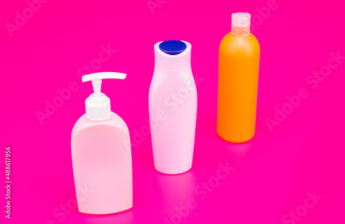For beauty products storing. Packaging bottles. Plastic bottles with flip cap and pump dispenser