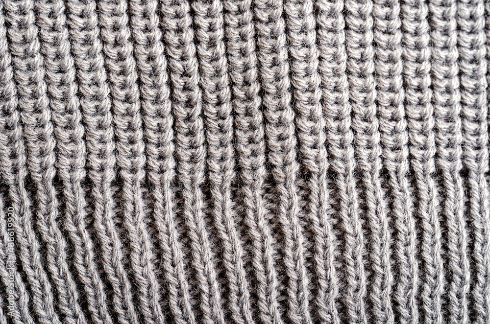 Knitted fabric. Texture close-up. Designer concept Knitted fabric. Texture close-up. Designer concept