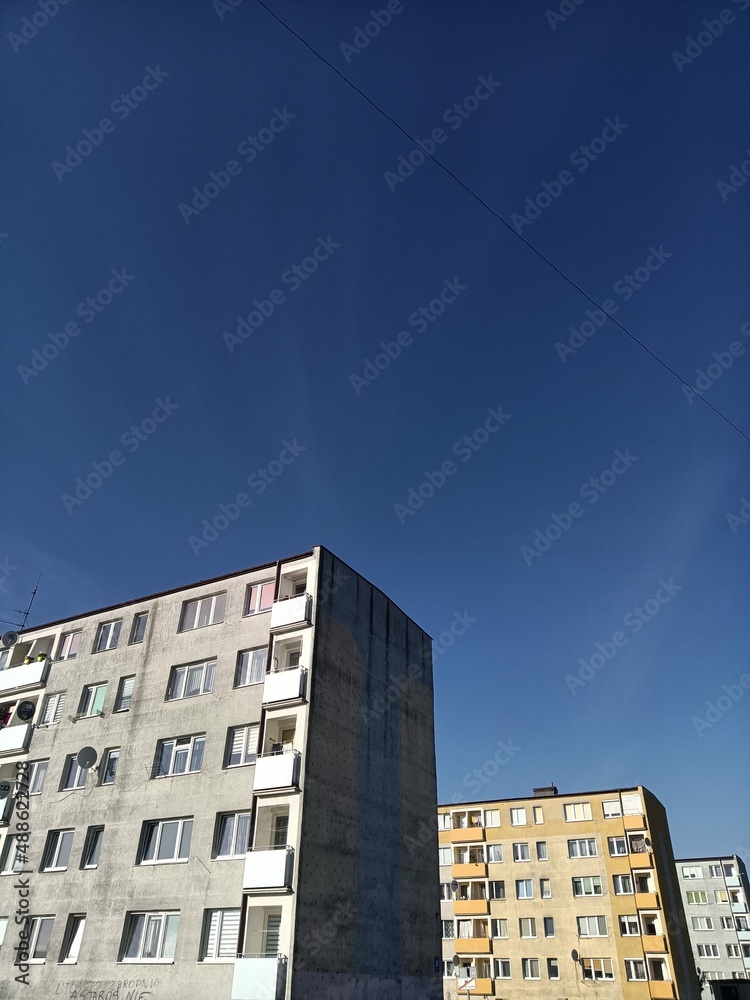 Fototapeta premium set of old soviet buildings seen from below
