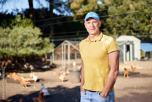 male farmer on chicken farm