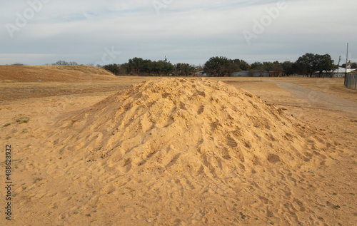 Pile of sand in open areas.