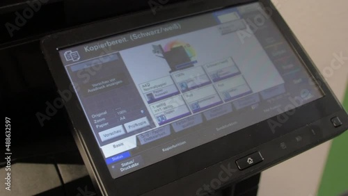 Camera slide along a display on the copier