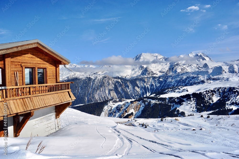 Wooden hut on the mountain in winter 