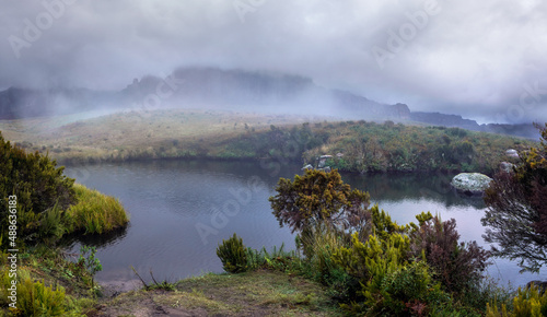 Evening scenery at base camp during trek to Pic Boby (Madagascar's highest accessible peak), small river in foreground, Andringitra massif background