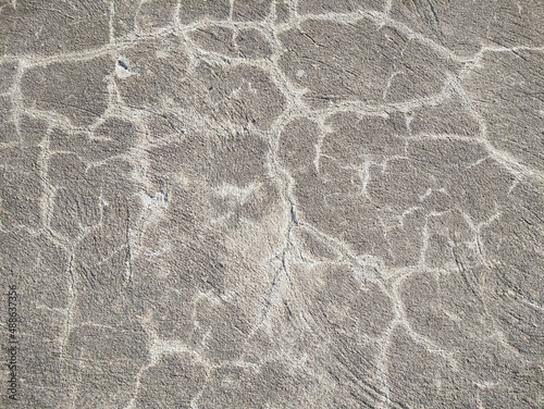 detail of white lines on a concrete floor. background texture