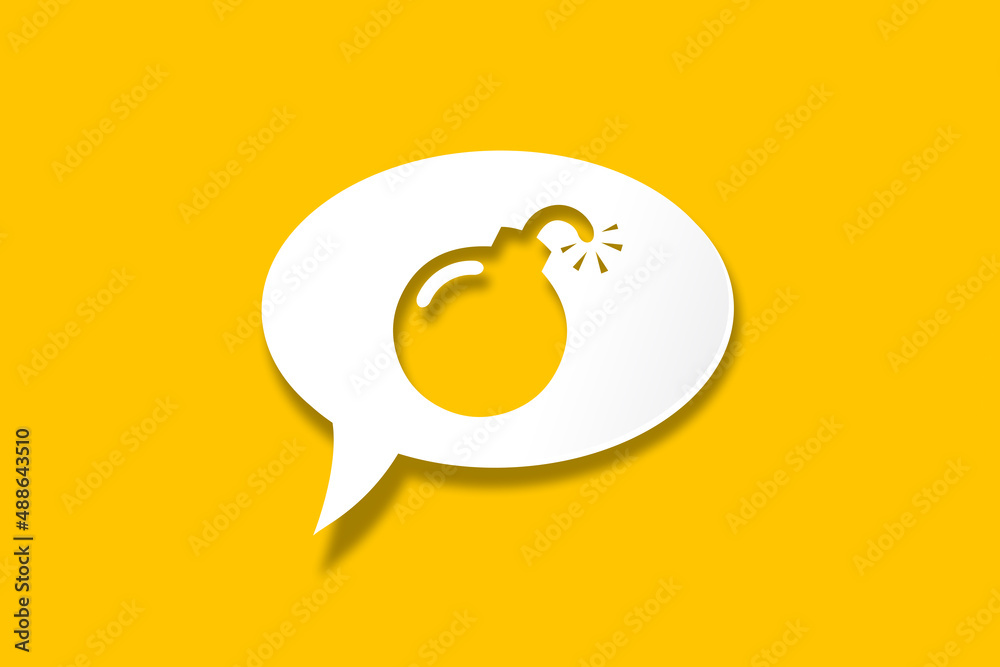 White speech bubble with cut out bomb shape over yellow background White speech bubble with cut out bomb shape over yellow background
