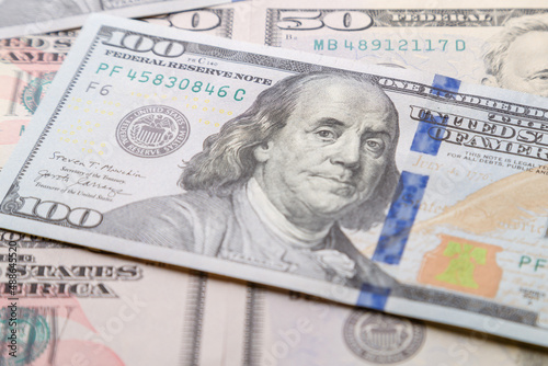 A bundle of fifty dollar bills close-up.