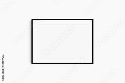 Horizontal frame mockup 7:5, 70x50, A4, A3, A2, A1 landscape. Single black frame mockup. Clean, modern, minimalist, bright. Passepartout/mat opening in 3:2 aspect ratio.