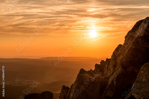 Rock formation at the summit of the Wolfwarte in the Harz Mountains at sunset