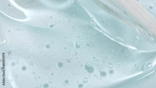 Wallpaper Mural Transparent Blue Cosmetic Gel Fluid. Beauty skincare product sample. Macro Shot Serum, Cream, hyalurinic acid. Organic cosmetics, medicine. Concept Skin care. High quality 4k footage Torontodigital.ca