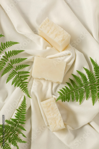 Natural handmade cocoa soap with ferm on white background, spa organic soap photo