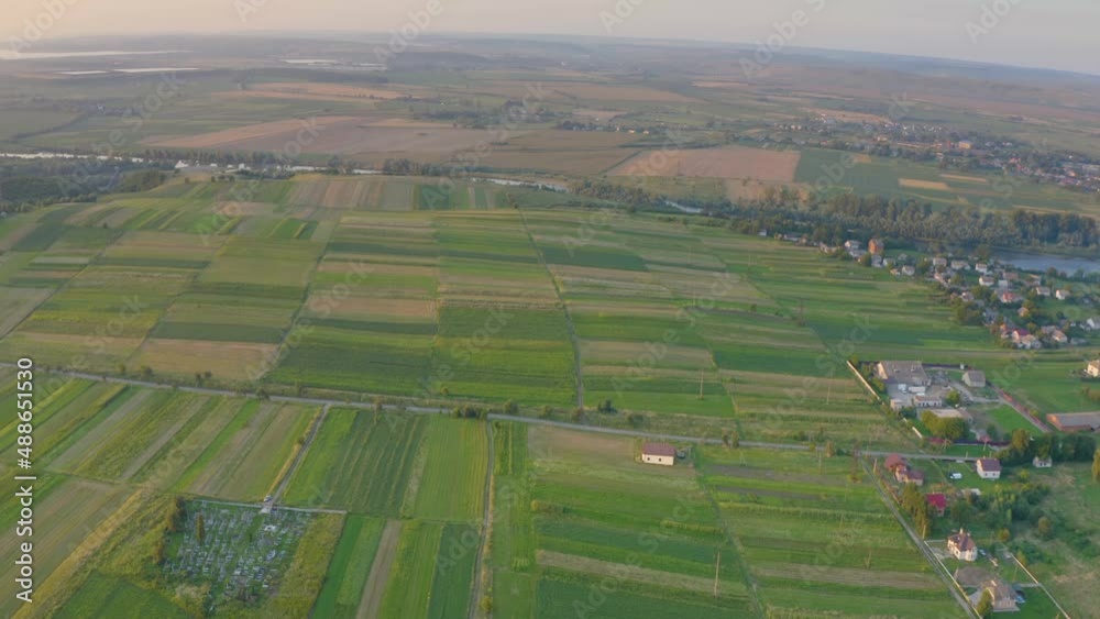 flight drone in the fields of the city of Galich and the village of Krilos, near the large Ukrainian river Dniester, solar panel. Artistic pattern of natural and artificial ornaments flight drone in the fields of the city of Galich and the village of Krilos, near the large Ukrainian river Dniester, solar panel. Artistic pattern of natural and artificial ornaments
