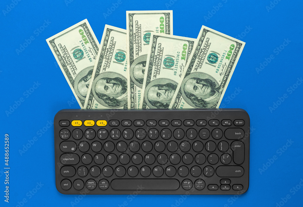 Keyboard typing the money. Freelance concept, concept of work at home, making money, workspace top view, flat lay design, copy space photo Keyboard typing the money. Freelance concept, concept of work at home, making money, workspace top view, flat lay design, copy space photo
