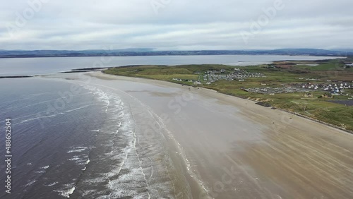 Flying above Rossnowlagh Beach in County Donegal, Ireland photo