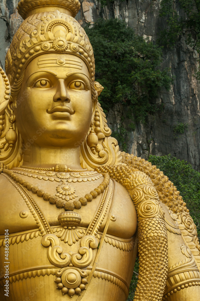 Close up of face of the Murugan Statue (Tugu Dewa Murugga) in Batu